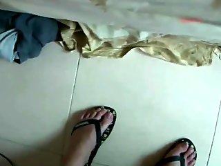 Feminine T-girl in pink lingerie masturbates with a condom